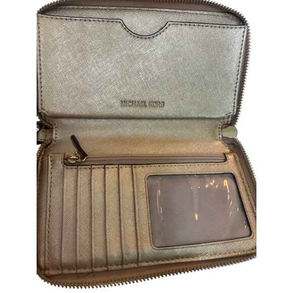 Michael Kors Jet Set Travel Leather Continental Wristlet in a gold metallic - Picture 4 of 7